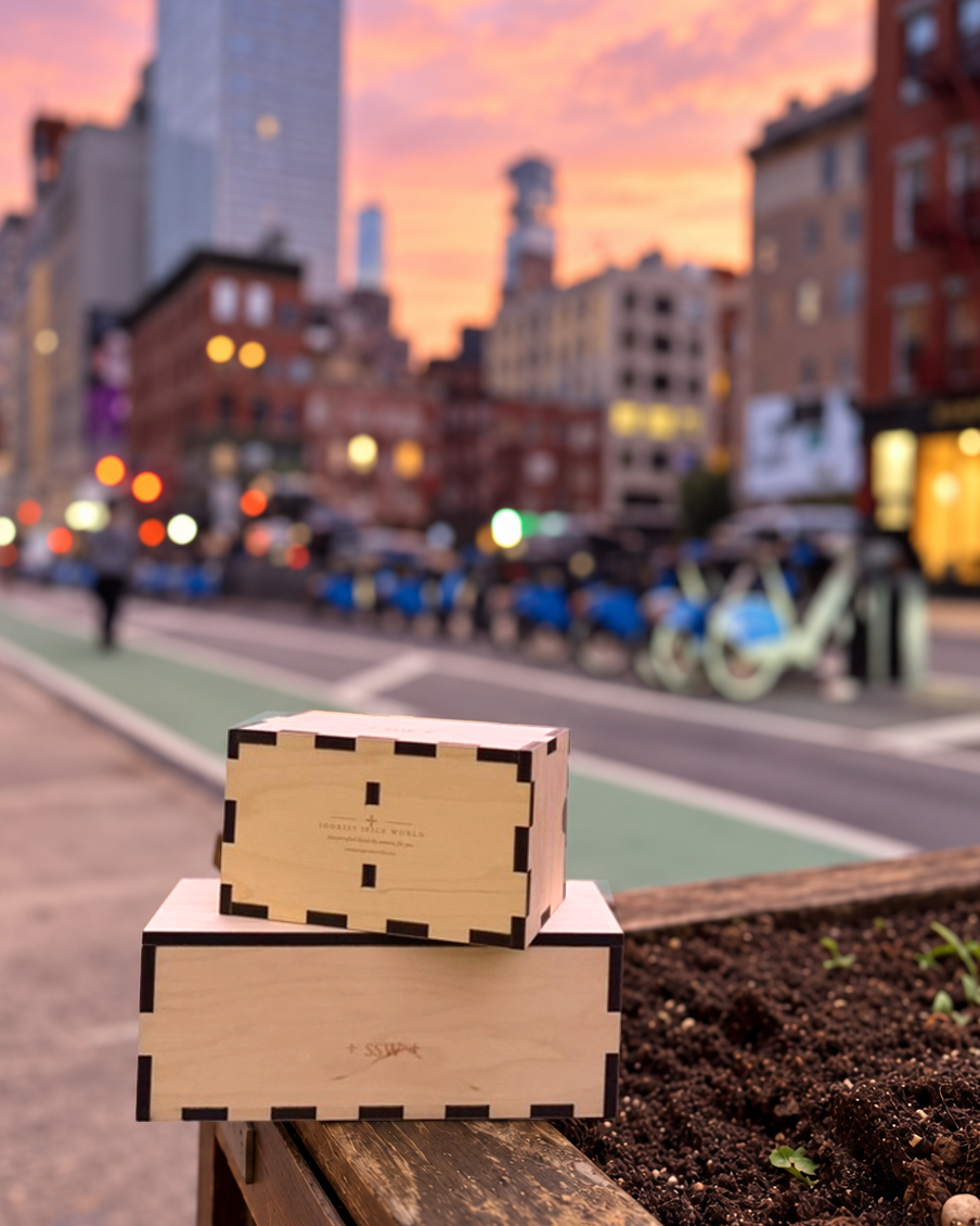 Two Sookies maple gift boxes at dusk on a Manhattan street